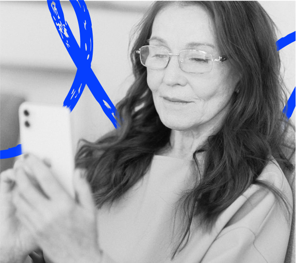 A woman looking at her smartphone screen