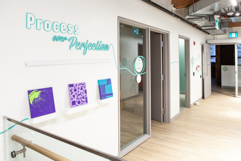 Signage identifying an art space.