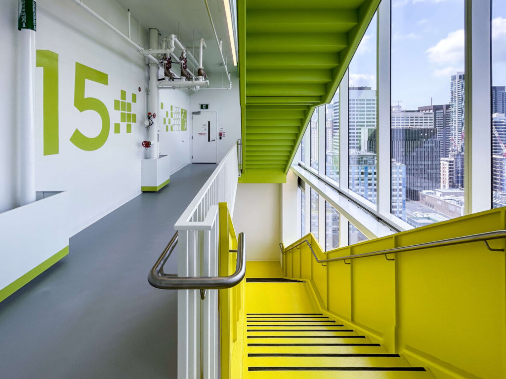 Colourful stairwell design in green and yellow.